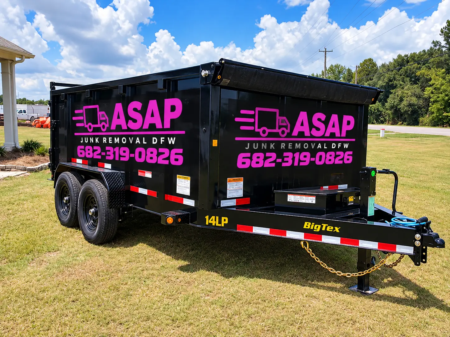 Black 14-foot ASAP Junk Removal DFW dump trailer parked on grass